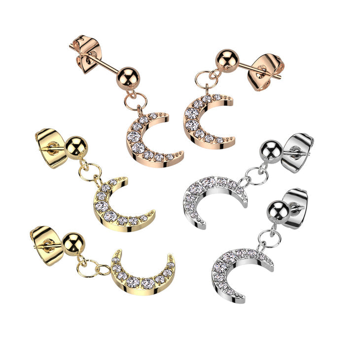 Pair of gold and silver earrings with crescent moon designs on a white background